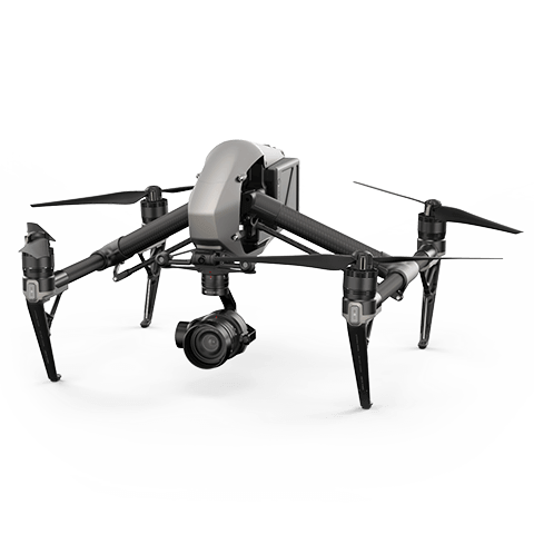 A grey DJI Inspire 2 professional quadcopter drone with its carbon fiber arms extended and propellers attached | Bubble Drone